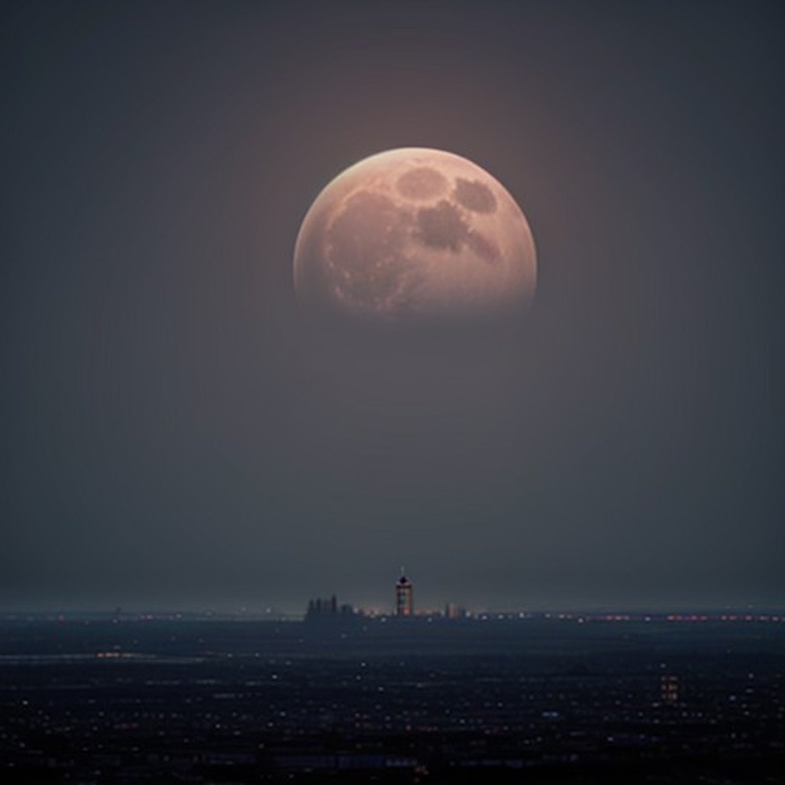A city on the moon at dawn.