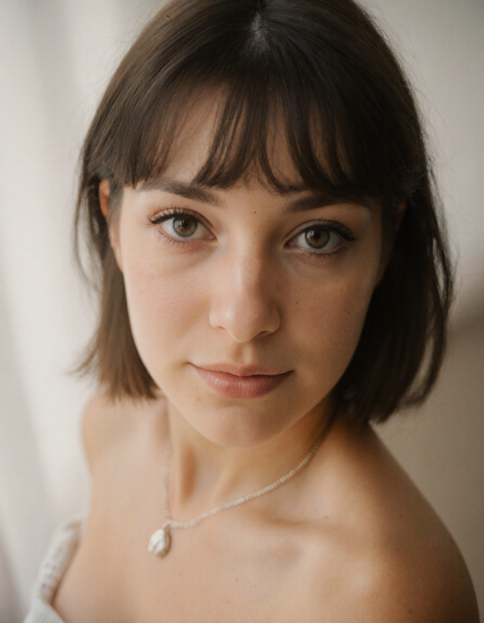 "Breathtaking over the shoulder shot photography of a Canada woman looking at viewer, necklace, looking over shoulders, eyelashes, fine hair detail, entire hairstyle visible, perfect eyes with iris pattern, sensual lips, nose, (perfectly sharp:1.3), realistic textures, (deep focus, focus on background:1.5), 8k uhd, dslr, ultra high quality image, film grain, Fujifilm XT3 <lora:Canada:1>"