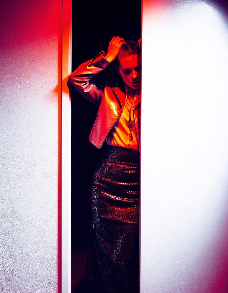 Bold sensual fashion graphic, medium portrait composition, dramatic minimalism, sharp silhouette, glossy wet s