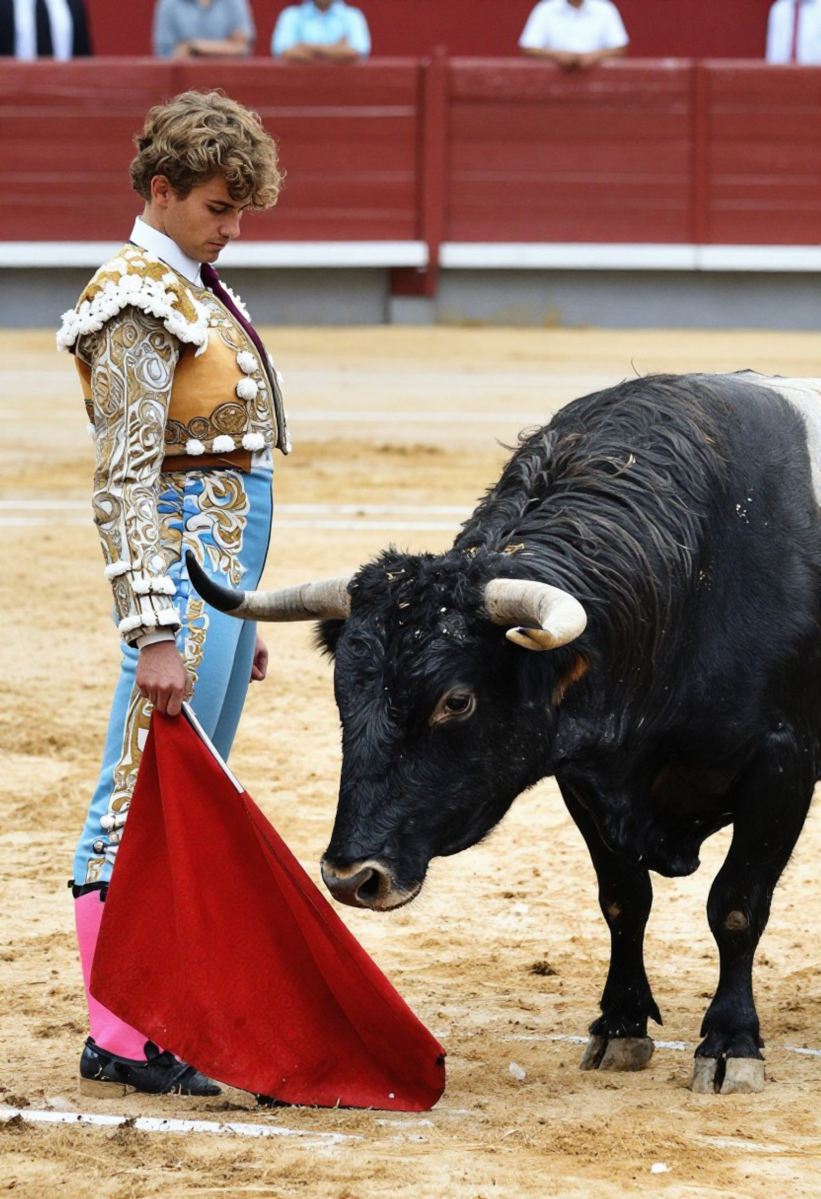 coniltralution art style: In the bullfighting arena, we see a matador taunting a large, ferocious black bull with a red cloth. The image is filled with expression and anxiety, as the bull stands opposite the matador, stomping the ground with its hooves. The bull lowers its head, preparing for an attack. <lora:Illustration_E16:0.8>